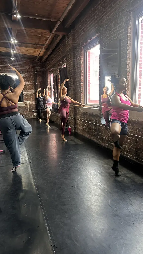 Second Chance Dance Returning Dancers Practicing Against A Window